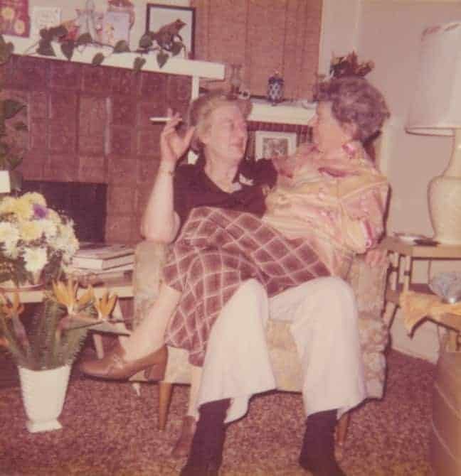 Dorothy Putnam Celebrating Her Birthday Sitting On The Lap Of A Friend. Undated., Hay una lesbiana en mi sopa